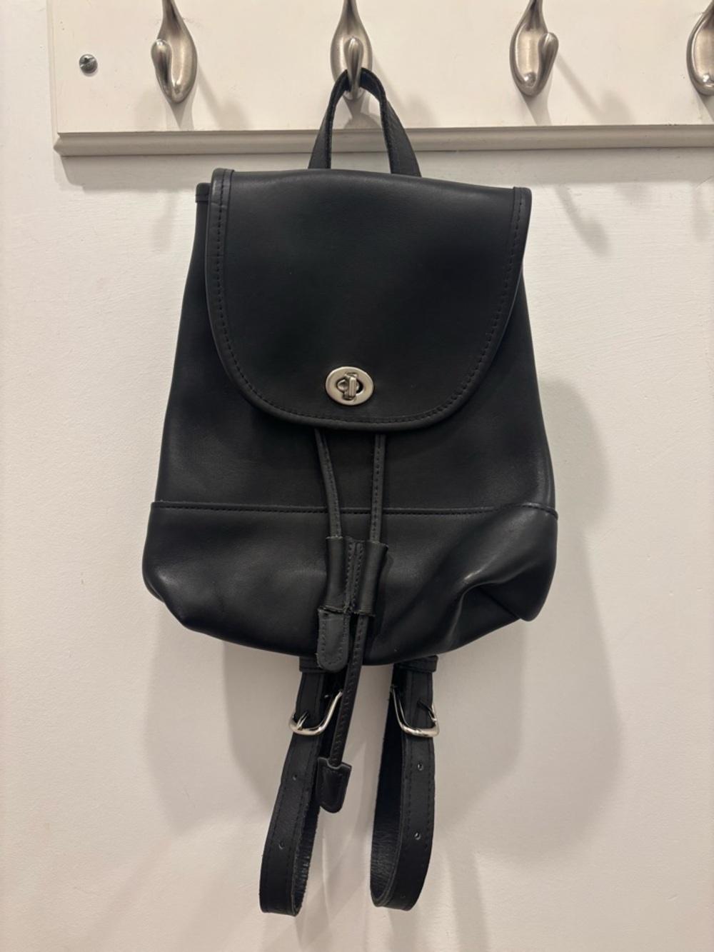 Coach Black Leather Mini Backpack with Turn-Lock Closure